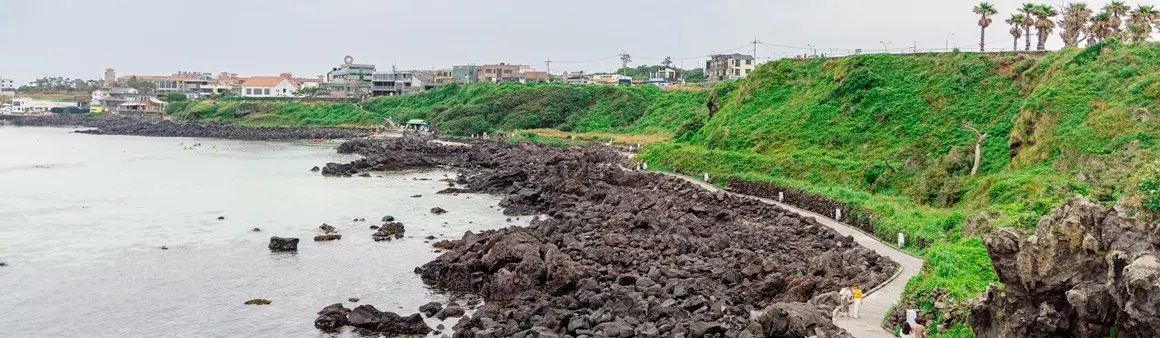 Coastal walking path with cafes