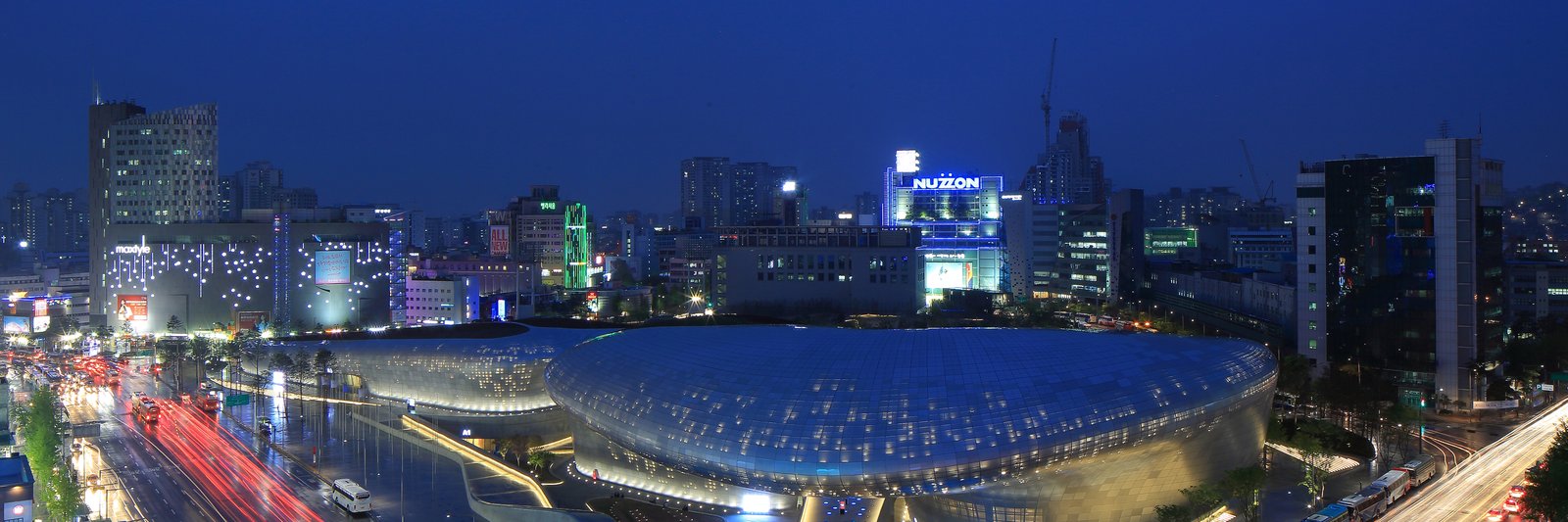 Dongdaemun Design Plaza (DDP) at night — the architectural landmark of the Dongdaemun shopping district