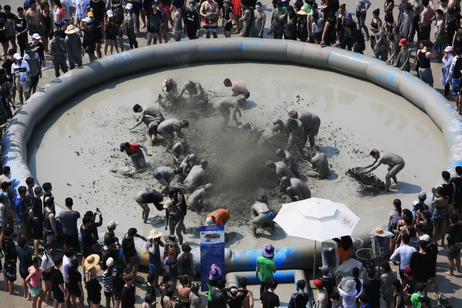 Crowds in mud pool at Boryeong Mud Festival