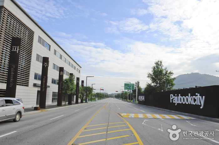 Paju Book City boulevard with modernist publishing-house buildings and signage