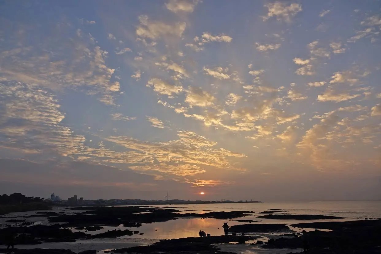 Hyeopjae Beach with white sand and turquoise water
