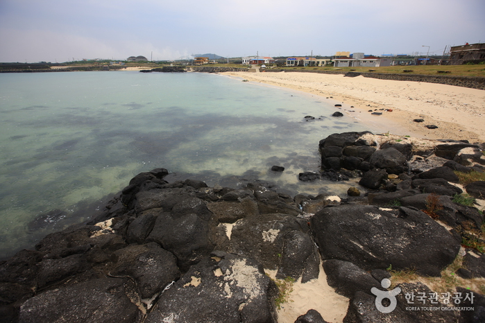 Hagosudong Beach on Udo Island — turquoise water with black volcanic rocks