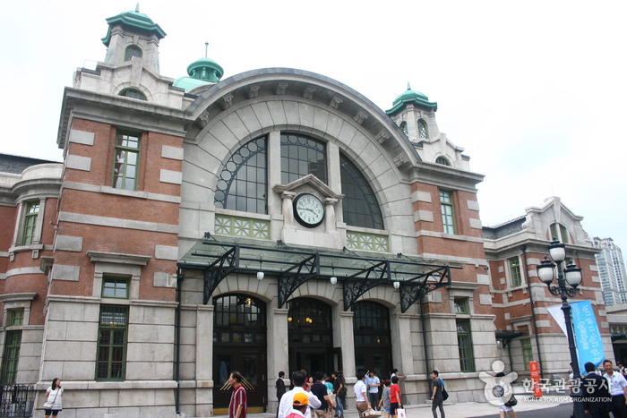 Historic Seoul Station main entrance with twin domed cupolas and clock tower